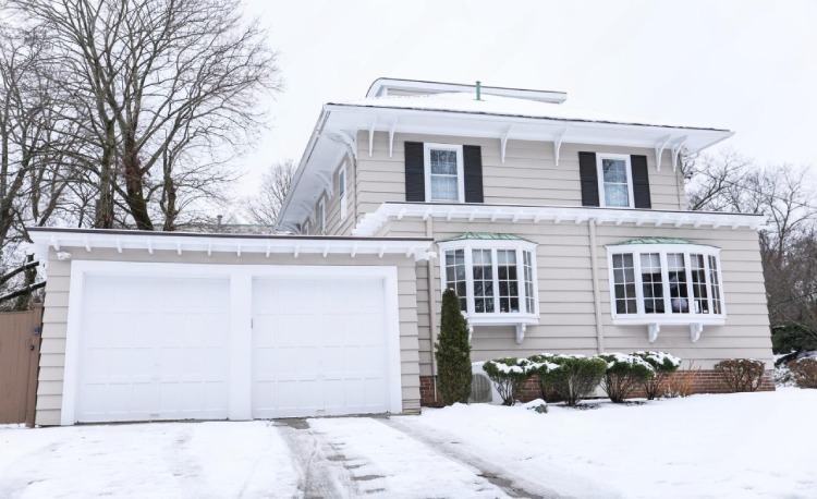 how weather in aurora, co affects your garage door 