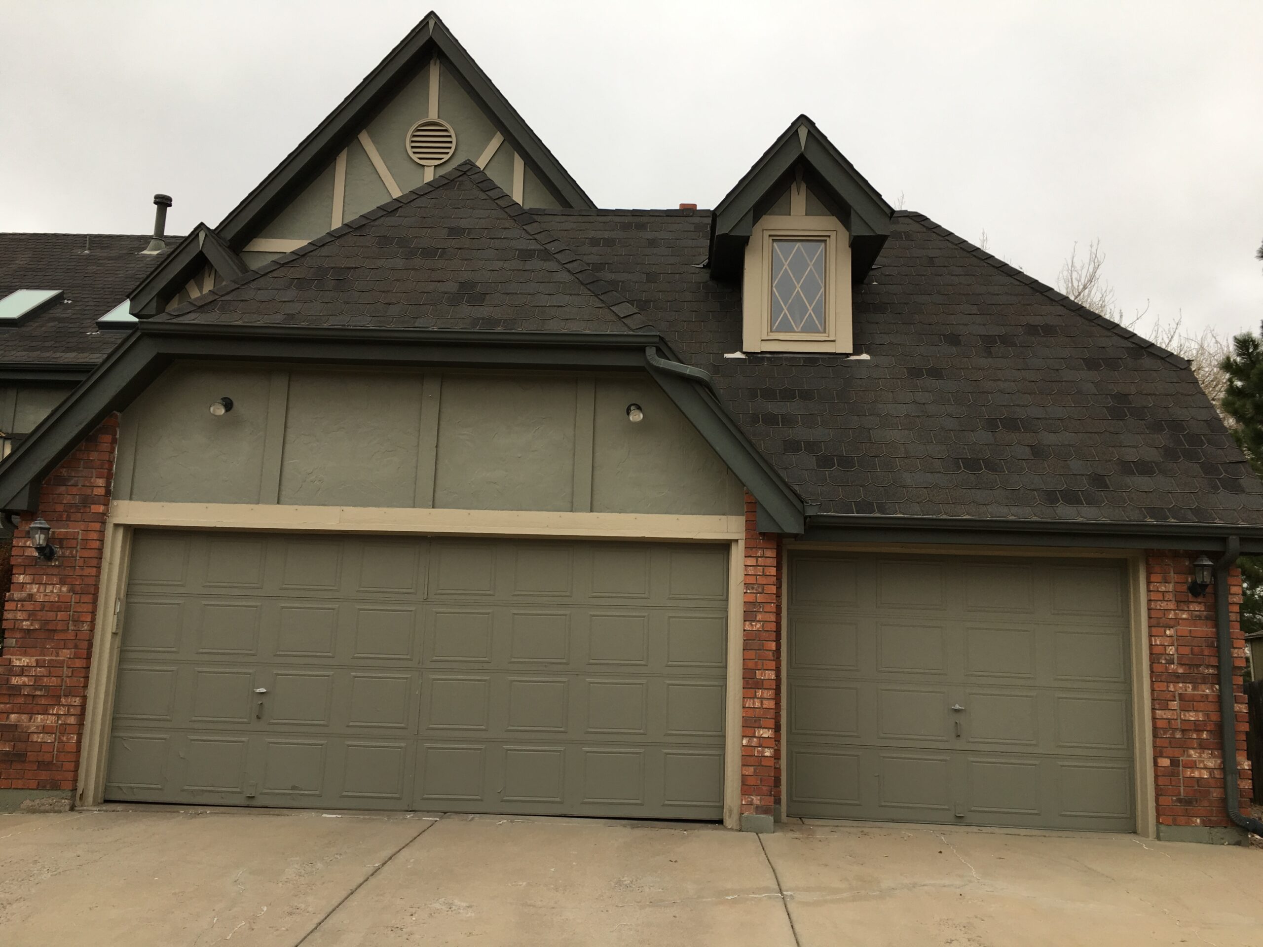 Before: Old damaged garage doors