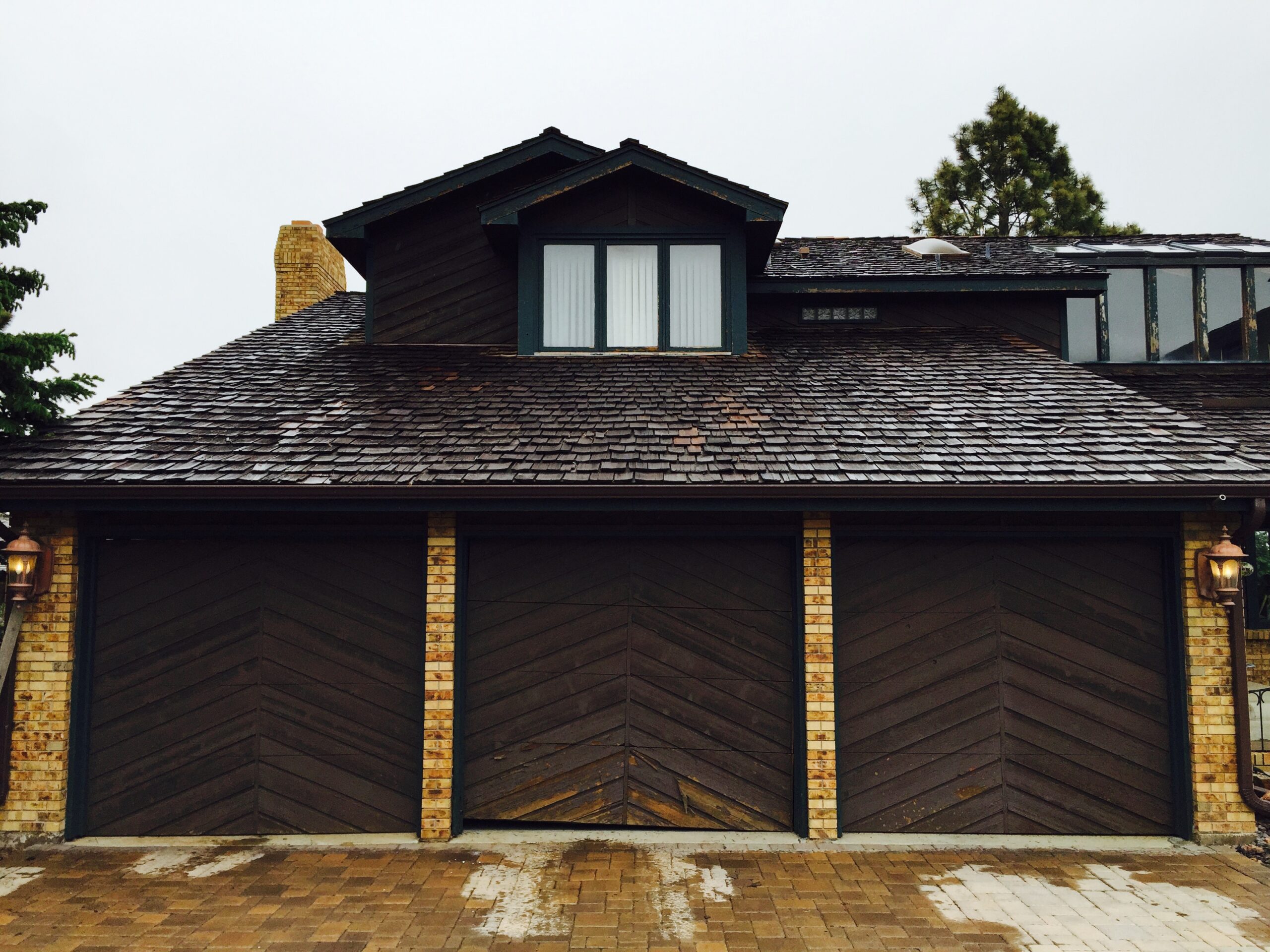 Before: Old damaged garage doors